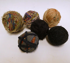 A Group of Six Old Yarn Balls in Various Material: Leftover Yarn