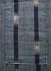 An Indigo Dyed Cotton Boro Fragment: Kasuri Stripes