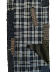A Length of Eccentrically Patched Plaid Cotton: Many Fragments