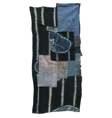 A Length of Tattered and Patched Shibori Dyed Cotton: Indigo