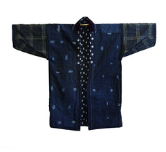 An Indigo Dyed Work Coat: Kasuri Outside, Shibori Inside