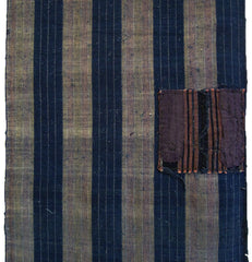 A Patched Length of Striped Cotton: Subtle Colors