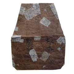 A Patched and Mended Paper Tea Pouch: Green Persimmon Tannin