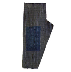 A Patched Cotton Trouser Leg: Stitched Closed