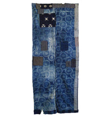 A Two Panel Katazome Dyed Cotton Boro Textile: Many Patches