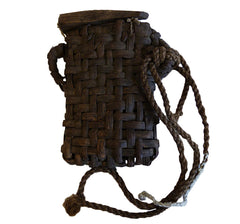 A Hand Woven Bark Basket: Blade Cover